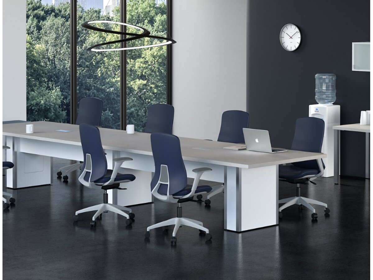 Newly furnished office with rows of desks and ergonomic task chairs