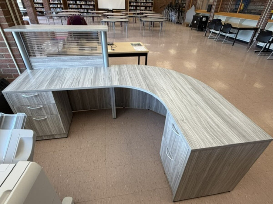 Library circulation desk and casegoods install for an Ontario school
