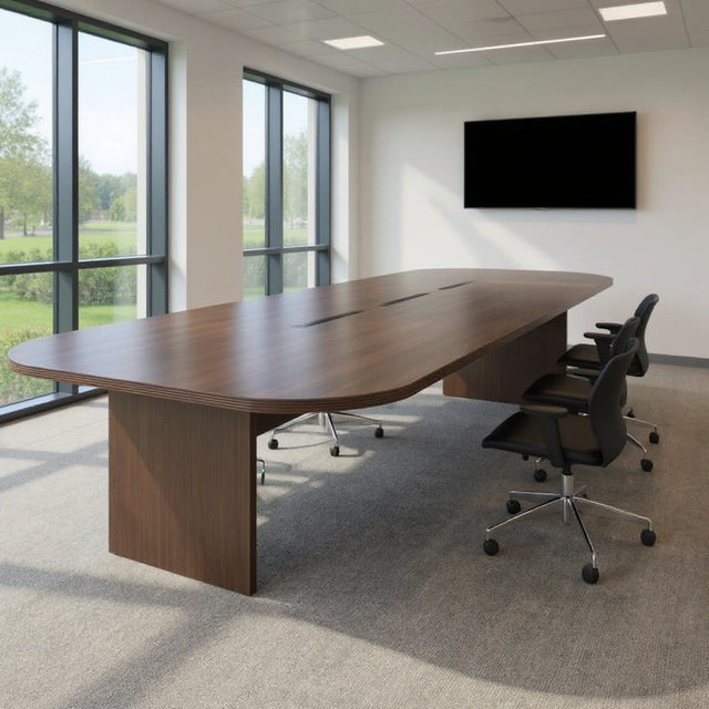 Boardroom with a large conference table and surrounding chairs