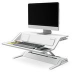 Lotus DX Sit-Stand Workstation (Dual Monitor Arm Extra) - Studio white background [AI office context]
