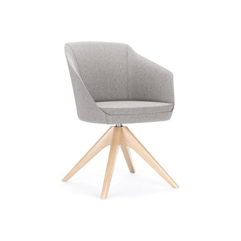 Global Drift upholstered lounge chair with a wood four-leg base in a collaborative workplace setting