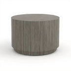 Premium plinth cylinder table, recessed base - Studio white background [AI office context]