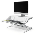 Lotus DX Sit-Stand Workstation (Dual Monitor Arm Extra) - Studio white background [AI office context]