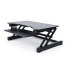 Sit Stand Adjustable Desk Riser 32" Wide - Studio white background [AI office context]